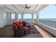 Inviting outdoor lounge area with comfortable seating and panoramic waterfront views at 2107 4Th Street W Ct, Palmetto, FL 34221