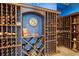 Custom wine cellar with wooden racks, blue walls, and ample storage for wine enthusiasts at 2107 4Th Street W Ct, Palmetto, FL 34221