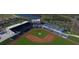 Aerial view of a baseball stadium with manicured green field, stadium seating, and surrounding nature at 21480 Eldred Ave, Port Charlotte, FL 33952