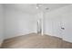 Spacious bedroom with neutral walls, tile floors, and ensuite bathroom access at 21480 Eldred Ave, Port Charlotte, FL 33952