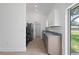 Modern kitchen with stainless steel appliances and plenty of natural light at 21480 Eldred Ave, Port Charlotte, FL 33952