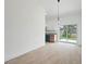 Bright living area with access to the kitchen and a view of the backyard at 21480 Eldred Ave, Port Charlotte, FL 33952