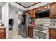 Modern kitchen with stainless steel appliances, granite countertops, and a stylish backsplash at 2411 Atwater Dr, North Port, FL 34288