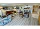 Spacious living area with modern furniture, dining area and breakfast bar at 25188 Marion Ave # F304, Punta Gorda, FL 33950