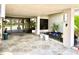 Lobby area with stone tile floors, indoor plants, and glass doors at 25188 Marion Ave # F304, Punta Gorda, FL 33950