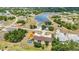 Aerial view of the community with a lake in the background at 26461 Explorer Rd # F, Punta Gorda, FL 33983