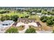 Scenic aerial view of condos with nearby golf course and beautiful landscaping at 26461 Explorer Rd # F, Punta Gorda, FL 33983