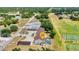 Aerial view of the community and a pool next to the buildings at 26461 Explorer Rd # F, Punta Gorda, FL 33983
