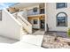 Exterior condo featuring a walkway to the front door, and an adjacent trimmed landscape at 26461 Explorer Rd # F, Punta Gorda, FL 33983