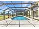 The property features a beautiful screened in pool with easy access at 26461 Explorer Rd # F, Punta Gorda, FL 33983