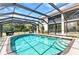 Clear pool enclosed for added comfort and privacy with ample space to relax and enjoy at 26461 Explorer Rd # F, Punta Gorda, FL 33983