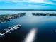 Beautiful aerial view featuring boats, waterfront homes, and a stunning view of the harbor at 303 11Th E Ave, Palmetto, FL 34221