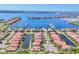 Aerial shot of a waterfront neighborhood with stunning marina views, luxury homes, and easy boating access at 303 11Th E Ave, Palmetto, FL 34221