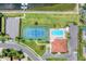 Overhead view of the community amenities, including a tennis court and swimming pool at 303 11Th E Ave, Palmetto, FL 34221