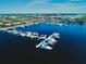 Magnificent aerial view of the harbor showcasing multiple boats docked and the beautiful community in the background at 303 11Th E Ave, Palmetto, FL 34221
