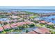 Beautiful aerial view showing community waterfront homes, ponds, and boat marina at 303 11Th E Ave, Palmetto, FL 34221