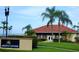 Inviting amenity center with lush landscaping, perfect for gatherings and community events at 303 11Th E Ave, Palmetto, FL 34221