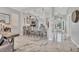Open concept view of kitchen featuring barstool seating, modern appliances, and seamless access to living room at 303 11Th E Ave, Palmetto, FL 34221