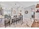 Spacious kitchen boasts marble floors, stainless appliances, and a large island with bar seating at 303 11Th E Ave, Palmetto, FL 34221
