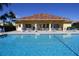 Stunning swimming pool and lounging area, ideal for relaxation and outdoor fun at 303 11Th E Ave, Palmetto, FL 34221