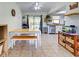 Dining area features tile floors, a dining table, and sliding glass doors at 4097 Rose Arbor Cir, Port Charlotte, FL 33948