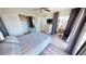 Bright bedroom with a closet, ceiling fan, and access to a lanai at 425 Belvedere Ct, Punta Gorda, FL 33950