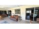 Spacious lanai featuring multiple seating areas and views of the pool at 425 Belvedere Ct, Punta Gorda, FL 33950