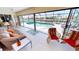 Enclosed lanai featuring a pool view, tiled flooring, and comfortable seating at 425 Belvedere Ct, Punta Gorda, FL 33950