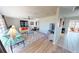 Bright living room area showcasing a modern interior with wood floors, stylish furniture, and natural light at 425 Belvedere Ct, Punta Gorda, FL 33950