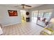 Open-concept living area with a view to the backyard pool at 425 Belvedere Ct, Punta Gorda, FL 33950