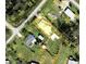 Aerial view showcasing property boundaries and home location with a spacious lot at 4344 Commercial St, Port Charlotte, FL 33953