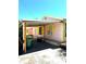 Charming home exterior featuring a covered patio and yellow trim, adding to its curb appeal at 4344 Commercial St, Port Charlotte, FL 33953