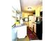 Charming kitchen with granite counters, custom cabinets, and stainless steel appliances at 4344 Commercial St, Port Charlotte, FL 33953