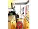 Functional kitchen space with appliances, granite countertops, and access to living area at 4344 Commercial St, Port Charlotte, FL 33953