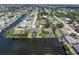 Picturesque aerial view of the waterfront property with canal access and a private dock perfect for boating enthusiasts at 453 Carolyn Ln, Punta Gorda, FL 33950