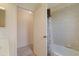 Cozy bathroom view with white-walled access to a carpeted storage area at 453 Carolyn Ln, Punta Gorda, FL 33950