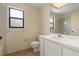 Bathroom featuring white fixtures, a tiled floor, and a walk-in shower at 453 Carolyn Ln, Punta Gorda, FL 33950