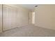 Bedroom featuring carpeted floors, closet with paneled doors, and neutral walls at 453 Carolyn Ln, Punta Gorda, FL 33950