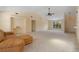 Bright living room featuring neutral paint, high ceilings, and plush carpeting at 453 Carolyn Ln, Punta Gorda, FL 33950