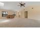 Comfortable living room featuring neutral carpet, ample space, and plenty of natural light at 453 Carolyn Ln, Punta Gorda, FL 33950