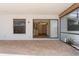 Covered patio featuring large windows that let in natural light to the adjoining kitchen at 453 Carolyn Ln, Punta Gorda, FL 33950