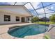 Sparkling pool within screened enclosure, perfect for relaxing and enjoying the outdoors at 453 Carolyn Ln, Punta Gorda, FL 33950