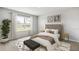 Cozy bedroom with a plush bed, decorative pillows, and a bright window view overlooking the garden at 4960 Tuscola Blvd, North Port, FL 34287