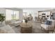 Open-concept living area flows into dining area and kitchen, creating an inviting atmosphere at 4960 Tuscola Blvd, North Port, FL 34287