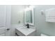 Clean bathroom featuring a white vanity and updated fixtures at 5333 Simrak St, North Port, FL 34287