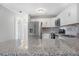 Well-equipped kitchen featuring stainless steel appliances and granite countertops at 5520 Kenwood Dr, North Port, FL 34287