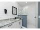 Chic bathroom featuring a glass-enclosed shower, granite countertop, and modern black fixtures at 6245 Alhambra Ave, North Port, FL 34291
