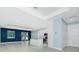 Spacious living room showcasing an open layout and easy kitchen access at 6245 Alhambra Ave, North Port, FL 34291