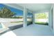 Screened patio offers views of the fenced backyard with a pool at 6245 Alhambra Ave, North Port, FL 34291