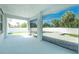 A screened patio offers views of a pool and fenced yard at 6245 Alhambra Ave, North Port, FL 34291